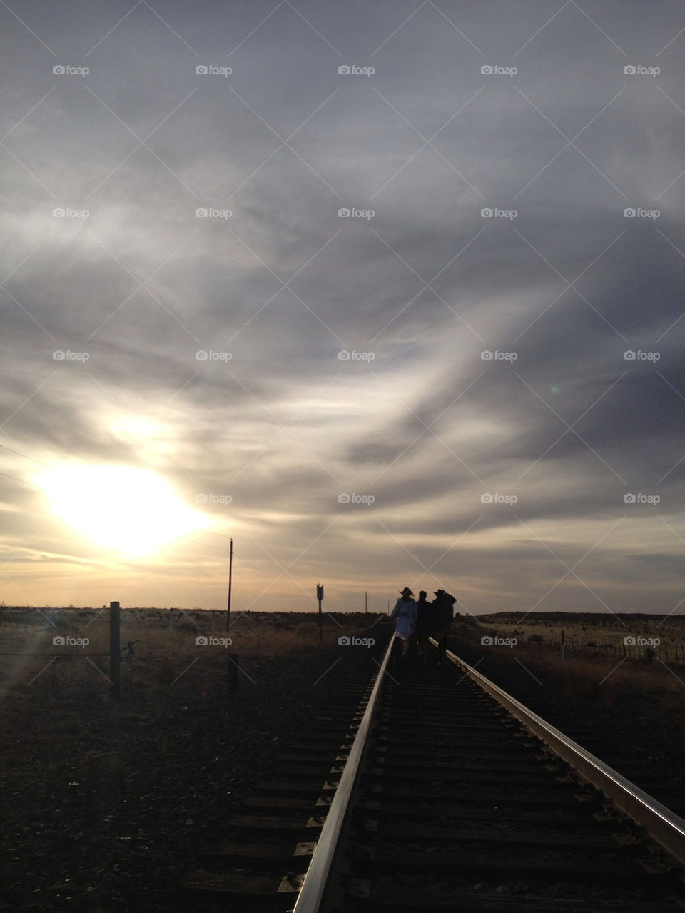 Train tracks. Sun set.
