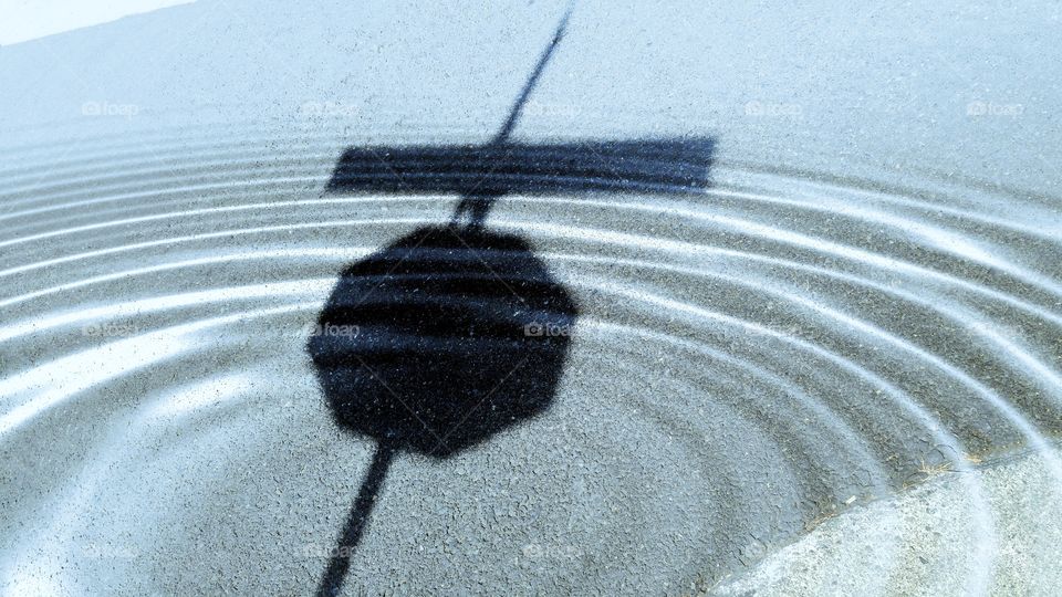 Shadow of a Stop Sign in Ripple