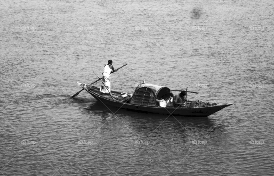 Father and son on the boat