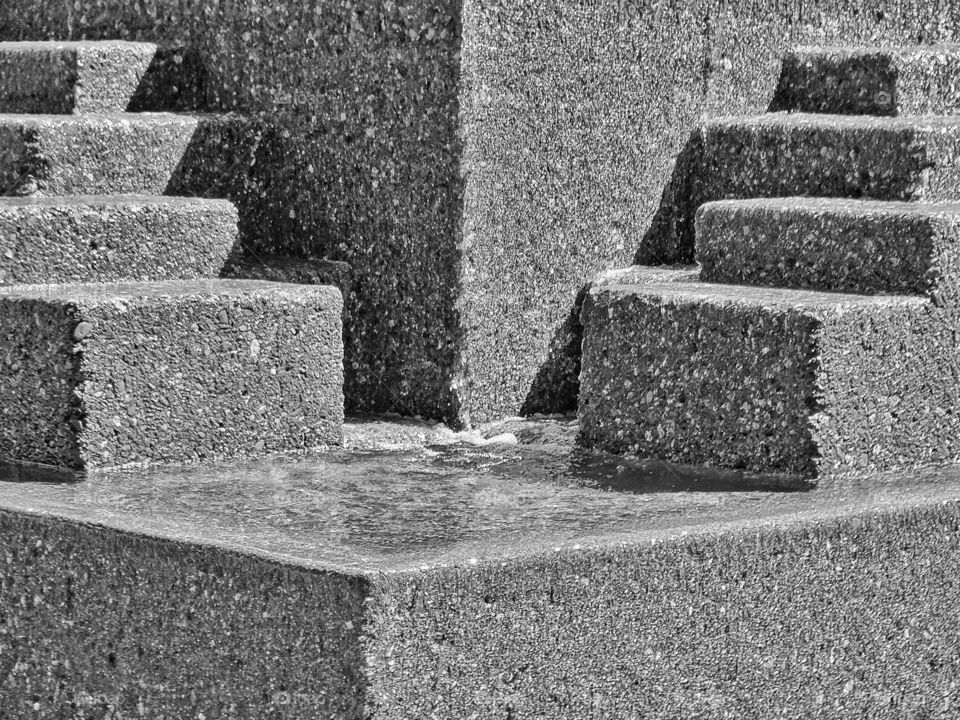 Concrete Water Sculpture. Modernist Water Fountain In City Park
