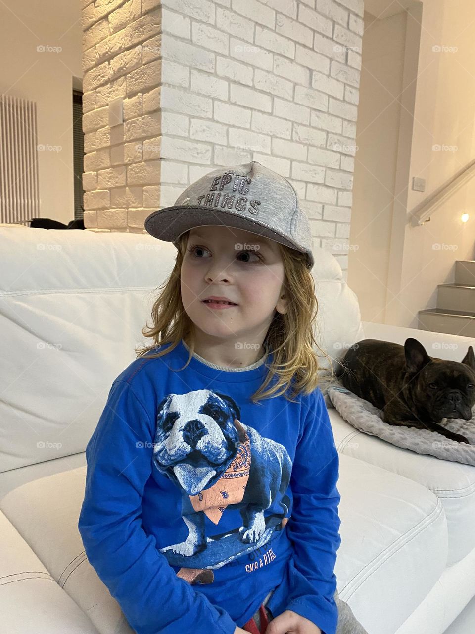 Boy sitting on a couch 