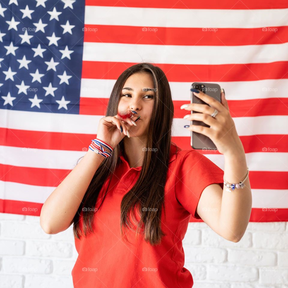 woman holding USA flag