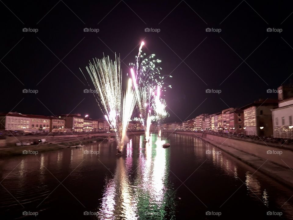 Fireworks in the river in Pisa