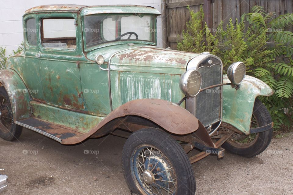 Old abandoned Ford car