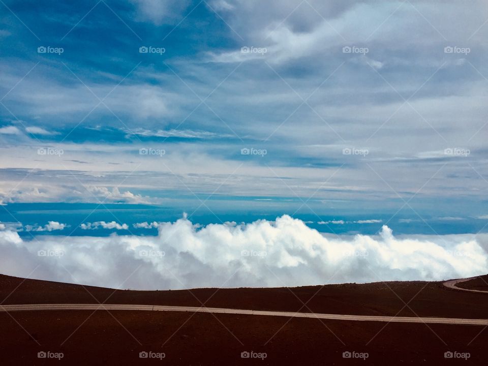 Top of the volcano above the clouds 