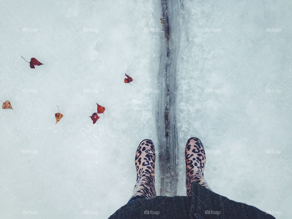 Feet view at the ice
