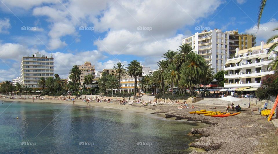 A beach in Ibiza. Beach always the most famous place to relax/ release ourself from stress/tension environment. Let exposed ourself in sunny day, sea water and wind to recharge our energy.