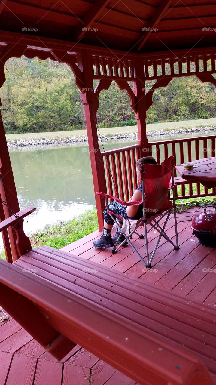 my son fishing in community pond