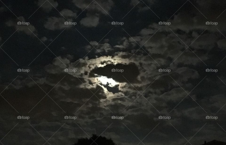 Moon hidden in clouds