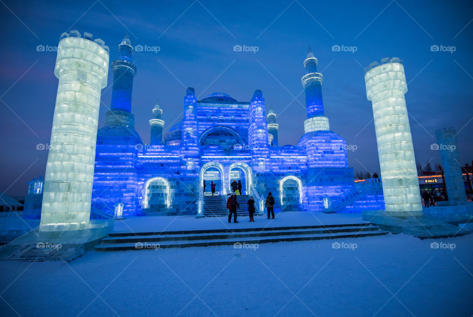 Asia china  Harbin ice Festival snow Festival ice sculptures snow building  snow ice in light colorful ice buildings at night full moon  Haigar Sofia