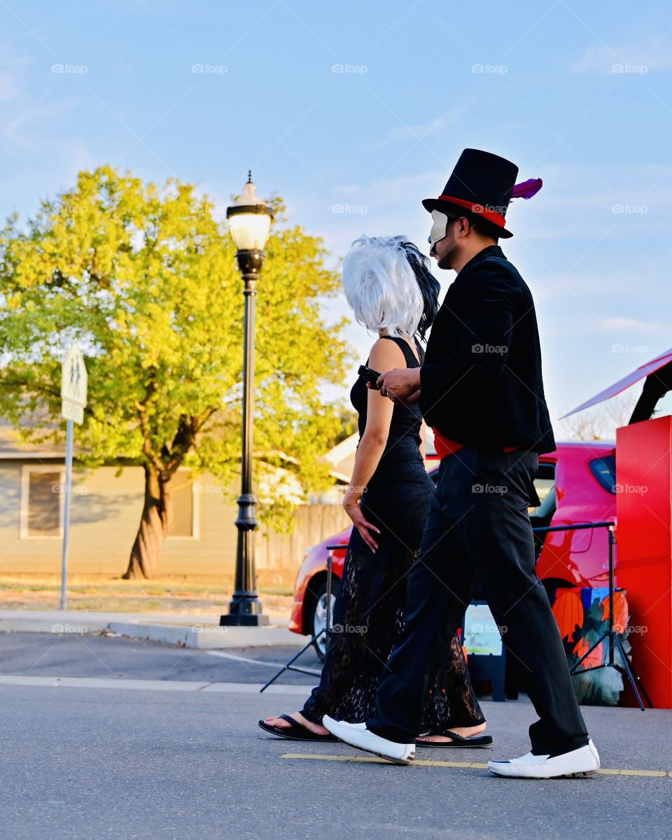 A couple who walks around during Halloween event at trunk and treat in Waterford, California 🎃
