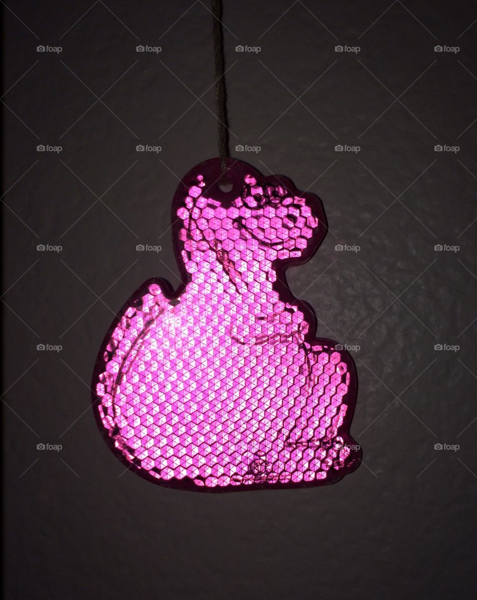 Pink dinosaur reflector 