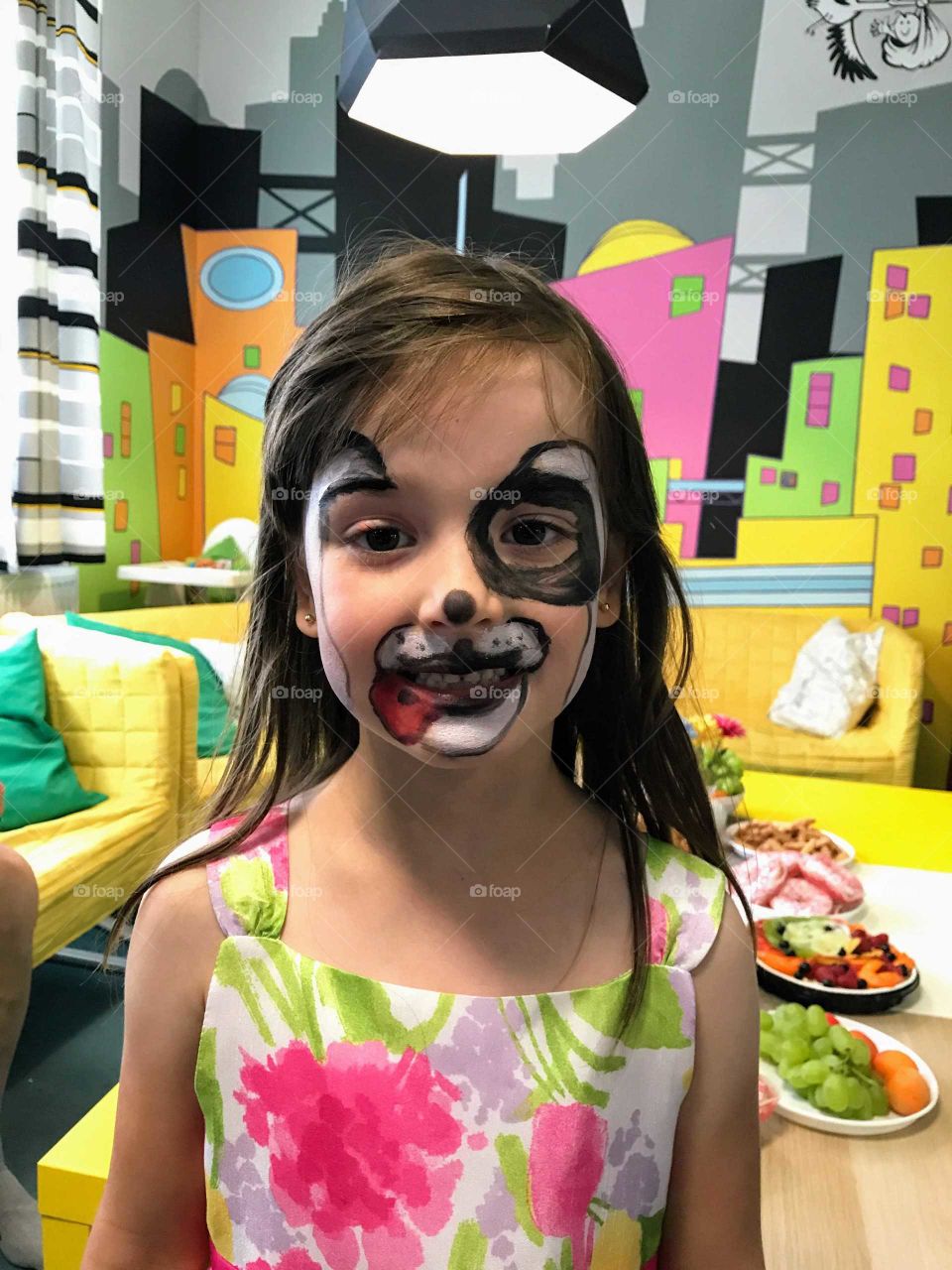 Portrait of a girl with face painted