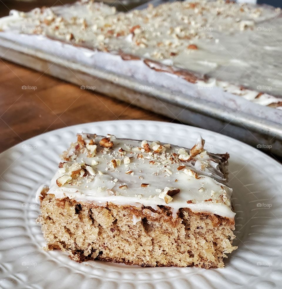 Banana cake with cream cheese icing and pecans. Life is good in the south.