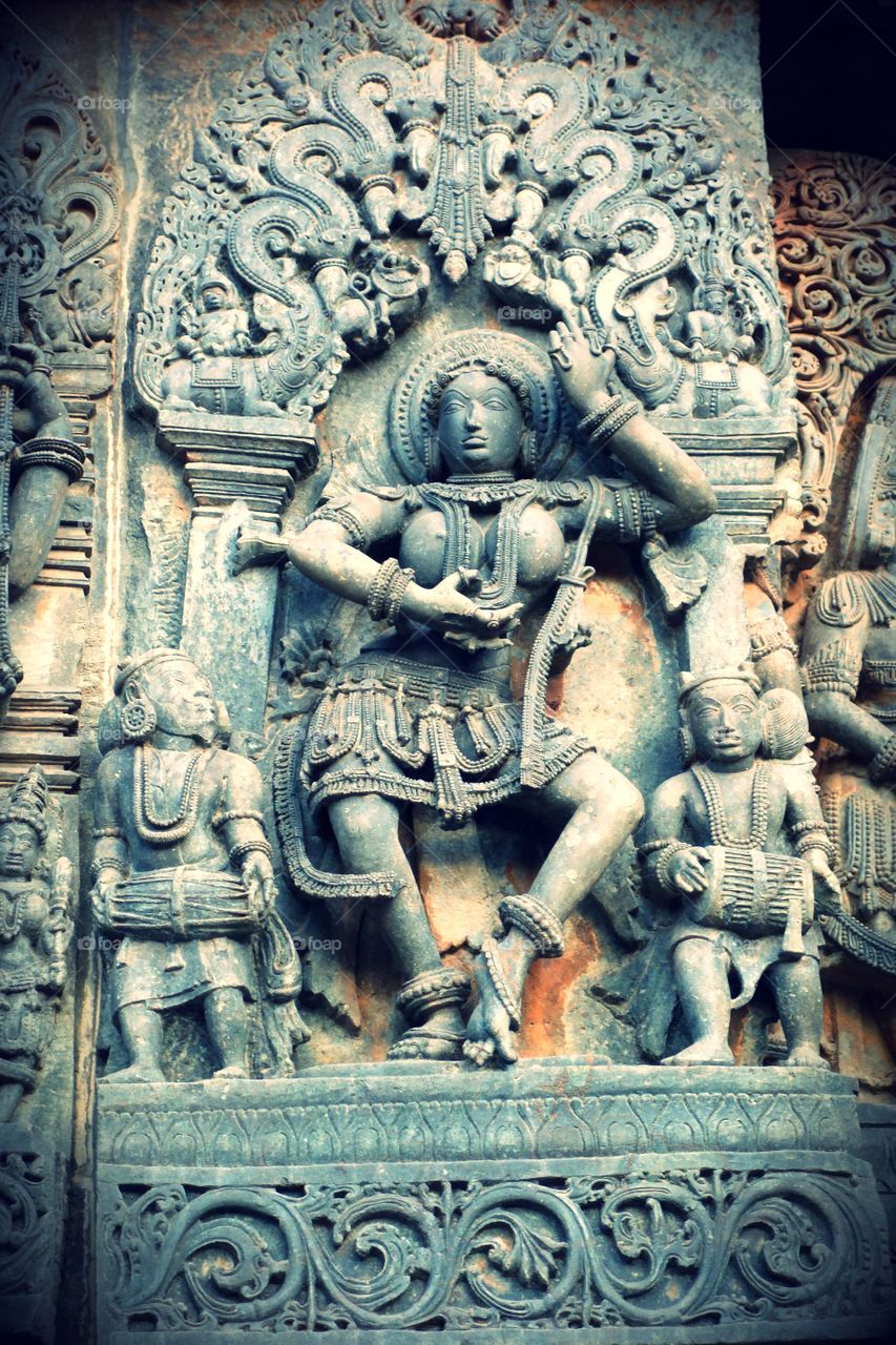 Halebeedu Hoysaleeswara temple - Queen Shantala devi performing Bharathanatiya - about to start a spin with her toe