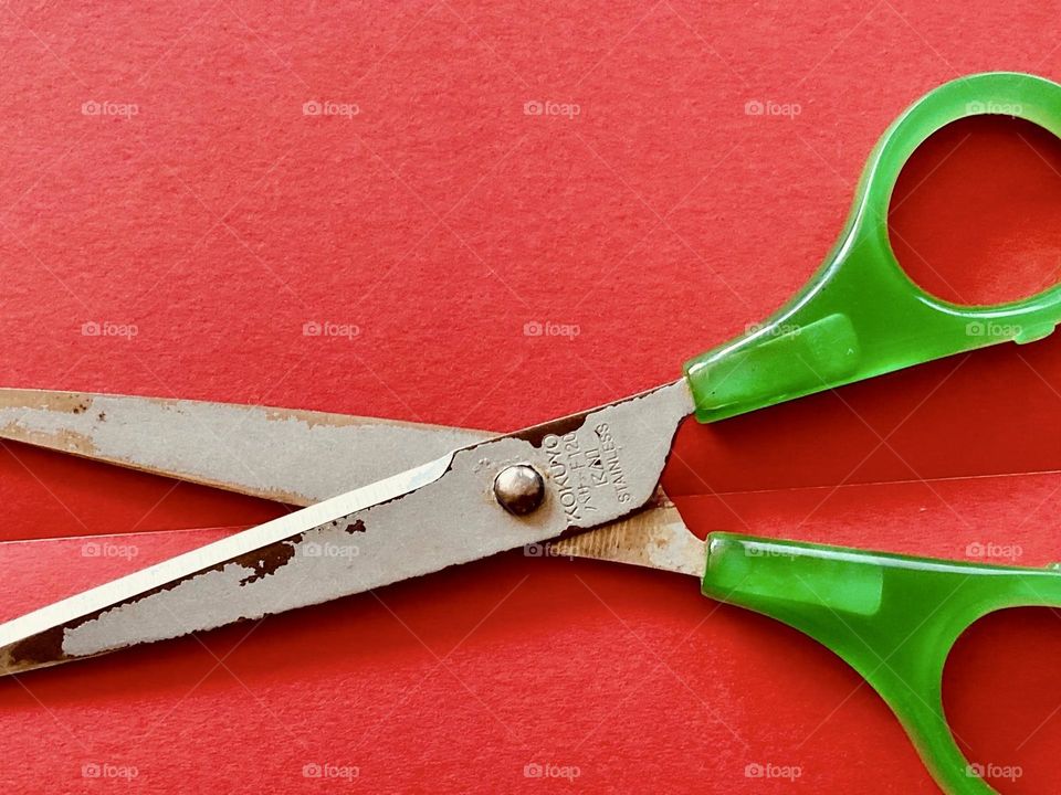 Green-handled scissors