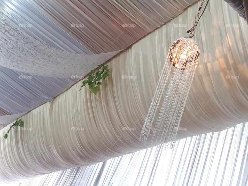 golden decorative lights on display at the party