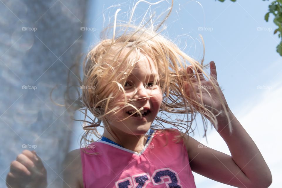 June Joy on the trampoline