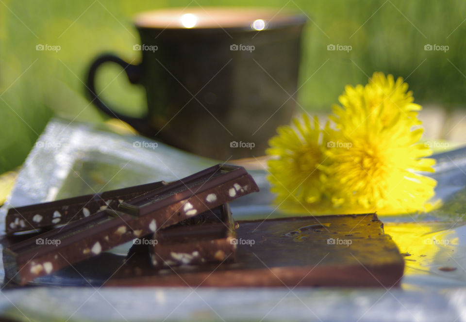 A cup of coffee and chocolate