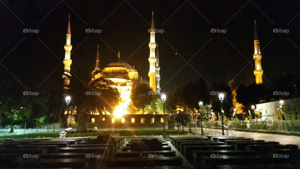blue mosque in istambul. blue mosque at night With people sleeping on park chairs