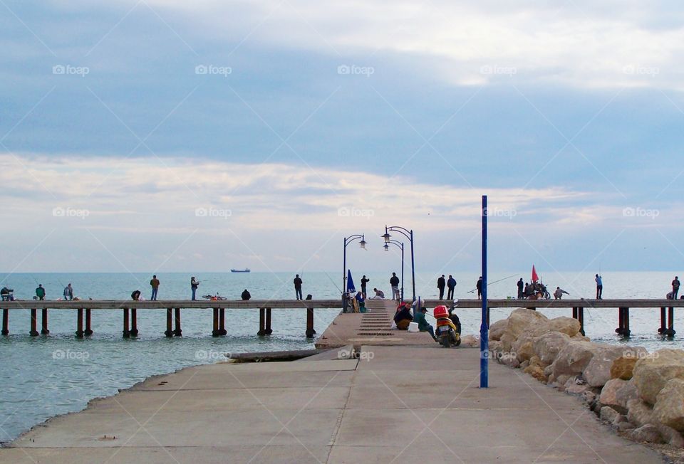 Fishing people on a deck