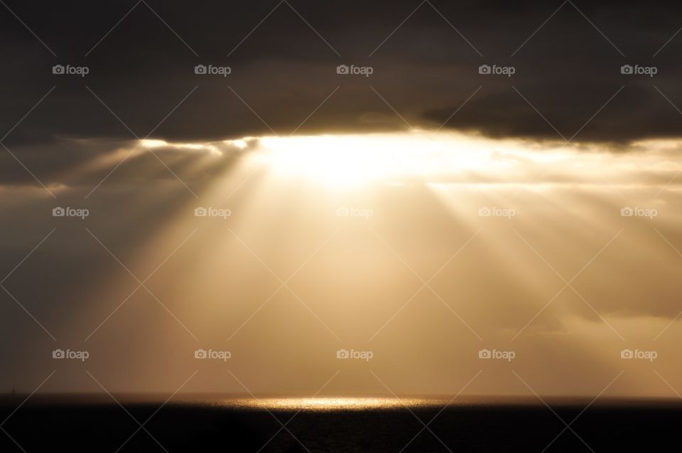 Sun cast spotlight on the ocean