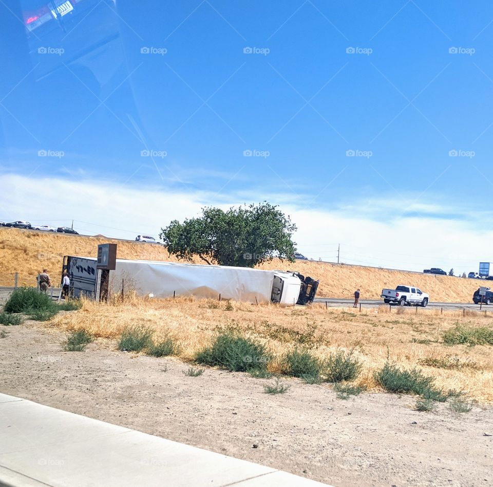 Remember when we were going to Target and right next to it we saw a big rig turned on it's side. Reminded me of my dad's big rig accident. The driver seemed ok and in one piece so that's good. Drive safe everyone!