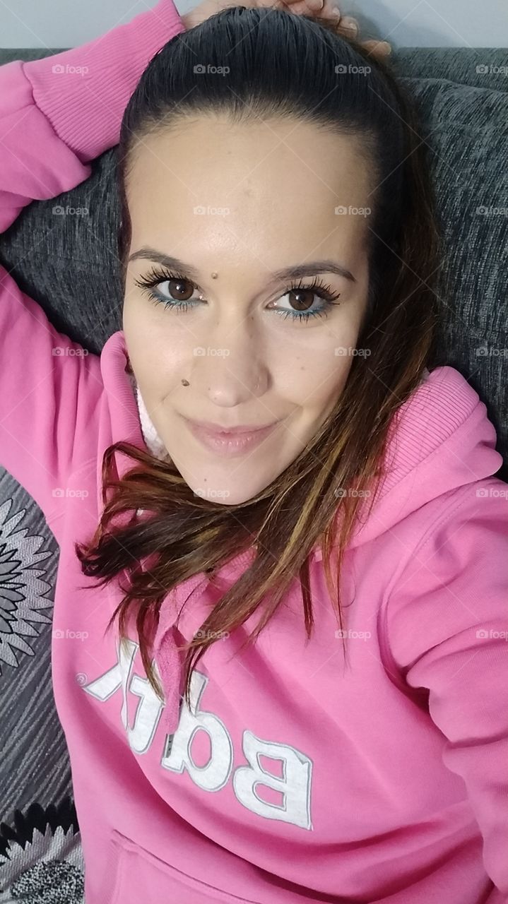 Beautiful girl laying on the couch