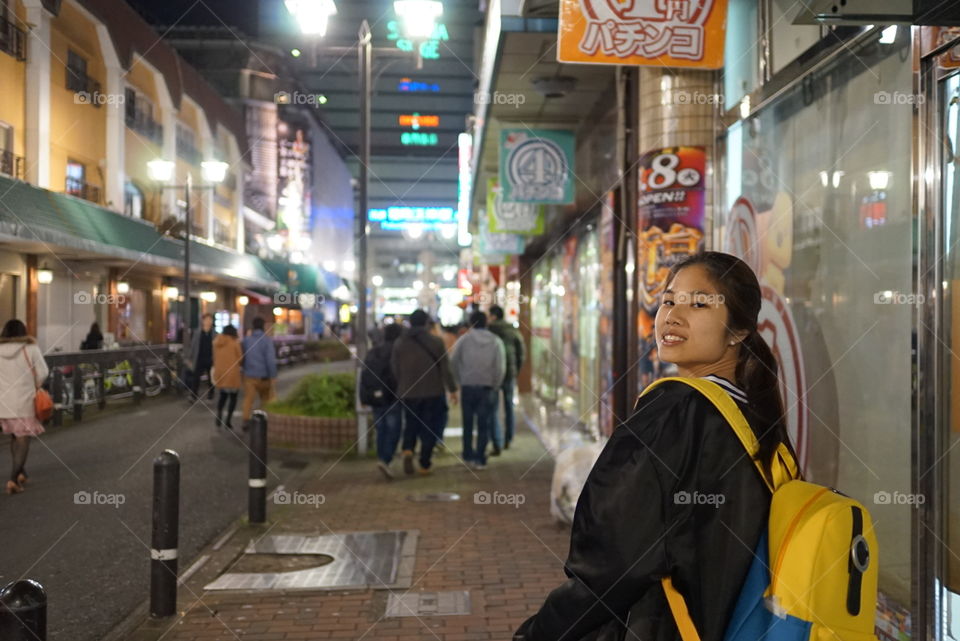 Japanese traveler in street of Fukuoka 