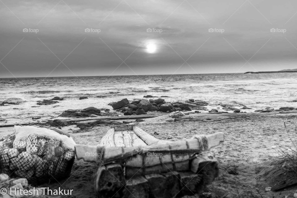 awesome sunset at the beach side. amazing sea side evening and dawn of the day.in amazing black and white