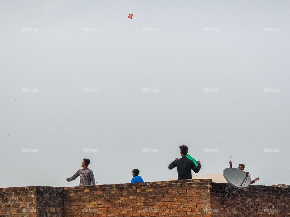 Kids enjoying flying kites ,most happiest moment of life if anyone enjoyed flying kites in childhood