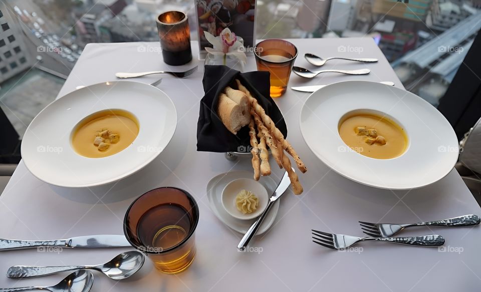 pumkin soup bread stick on the table at restaurant