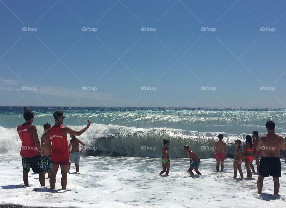 Kids, big waves... and two lifeguards