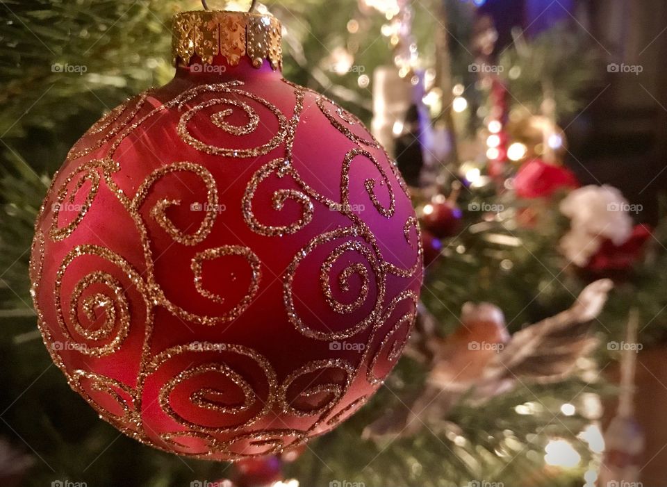 Red Christmas decoration on a Christmas tree
