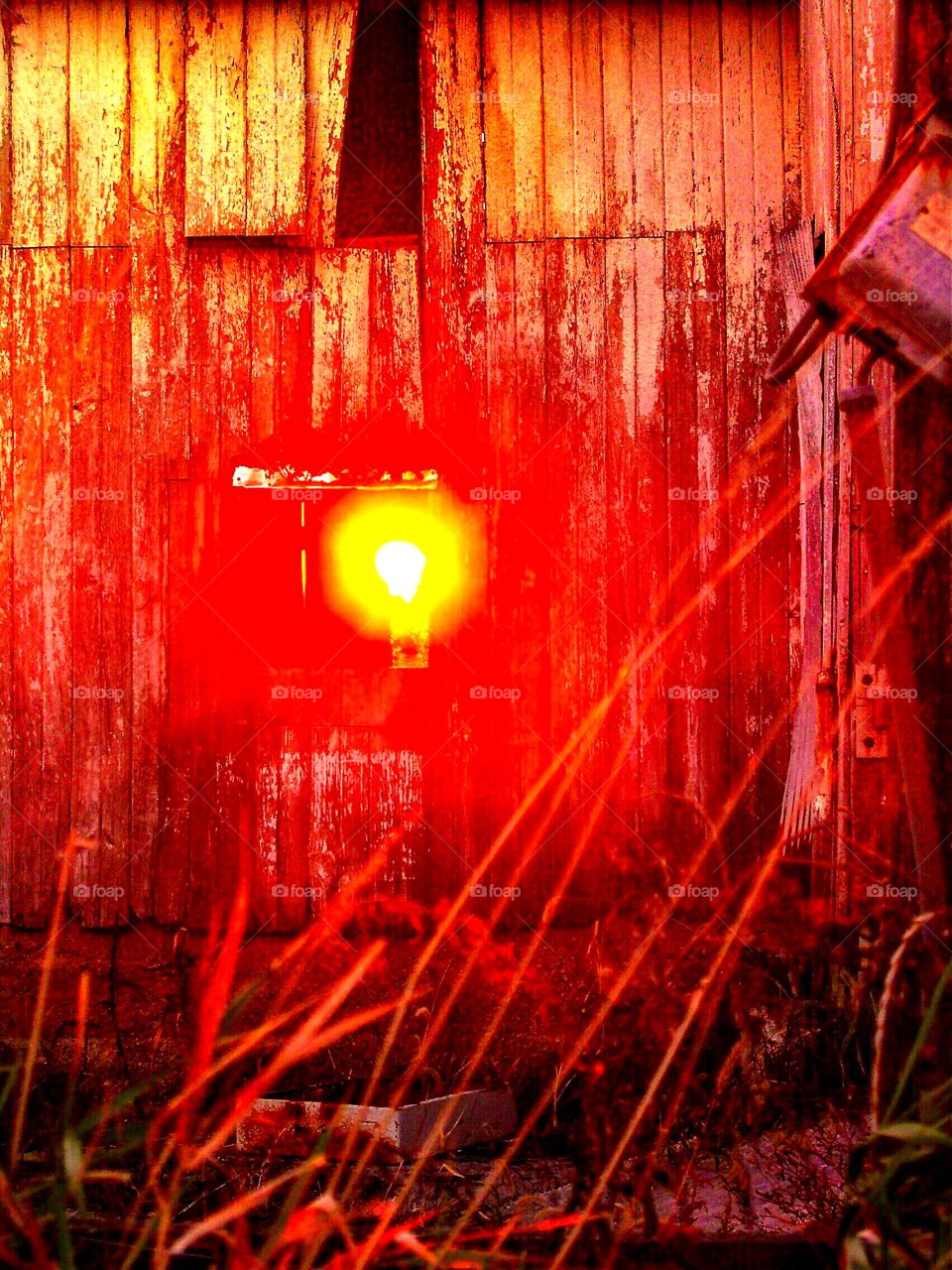 Sunset through an old Indiana barn. 