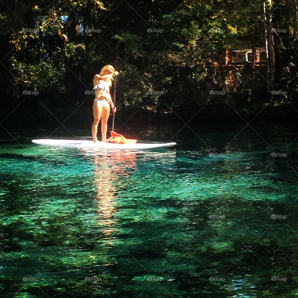 Nature lover. Paddleboarding in 3 sisters springs