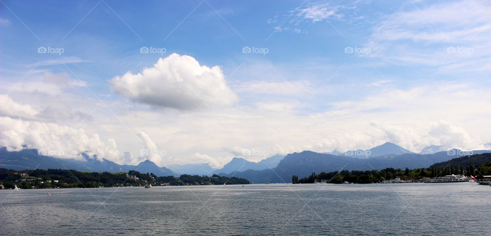Taken a boat ride on lake Lucerne. Clouds in Lucerne are so wonderful to watch. 