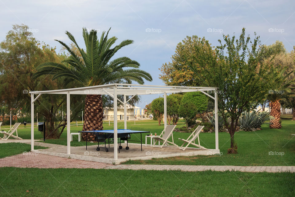 Relaxing zone in the garden in Greece resort
