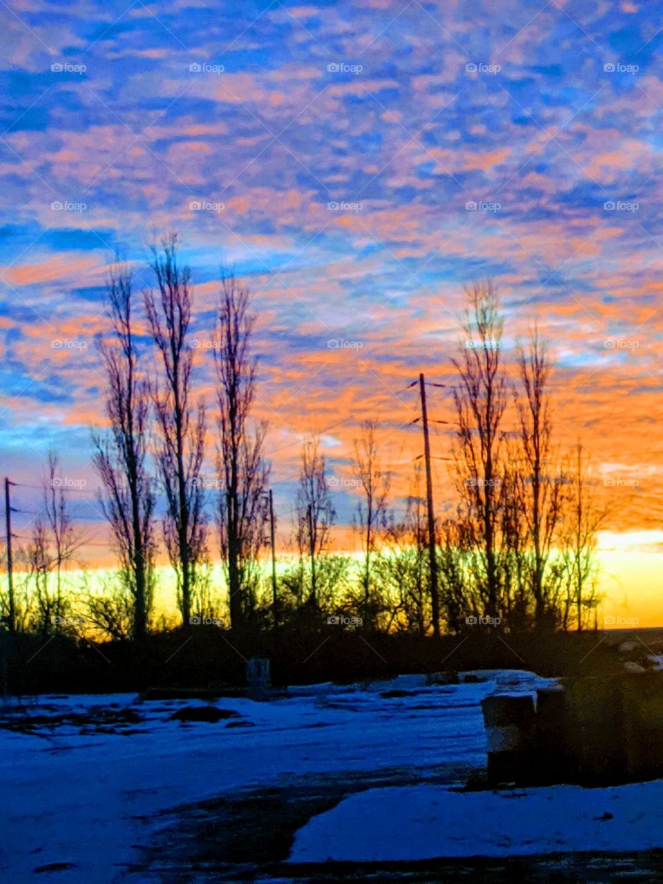 Colorfull winter sunset in the country