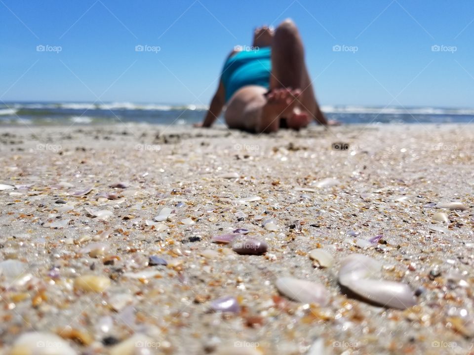 sunbather at the beach