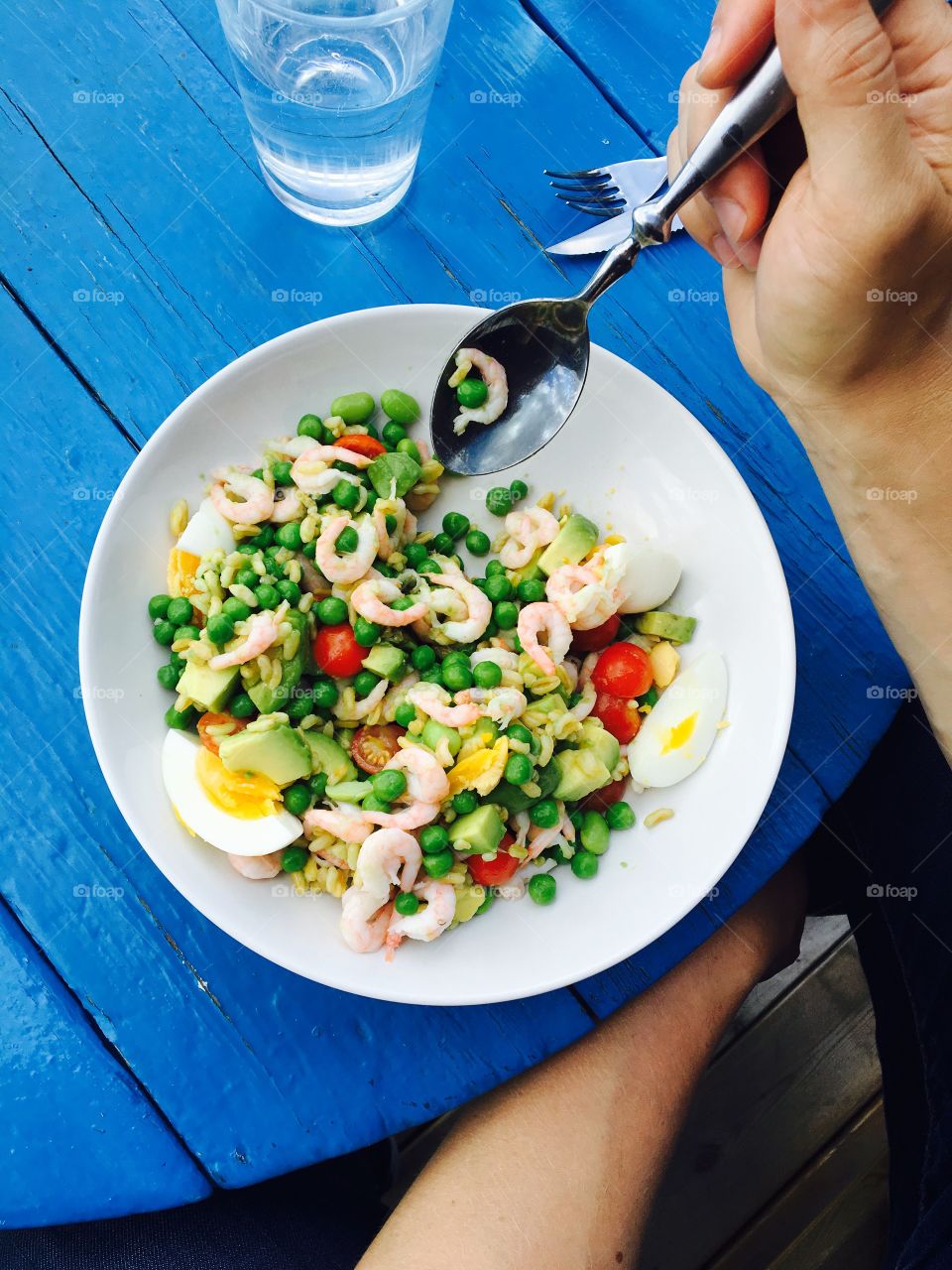 Close-up of person's hand with food