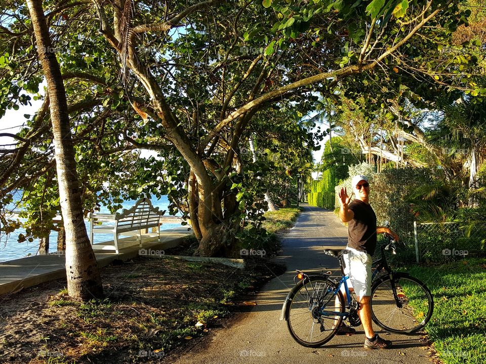 Enjoying a late afternoon bicycle ride on the Lake Trail in Palm Beach