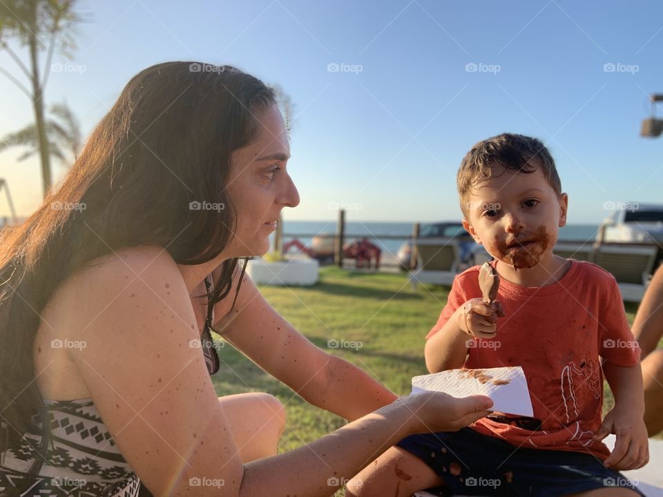 Children Eating a chocolate ice cream 