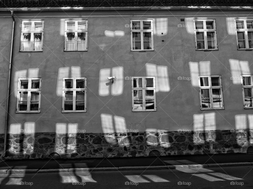 Wall with windows and shadows