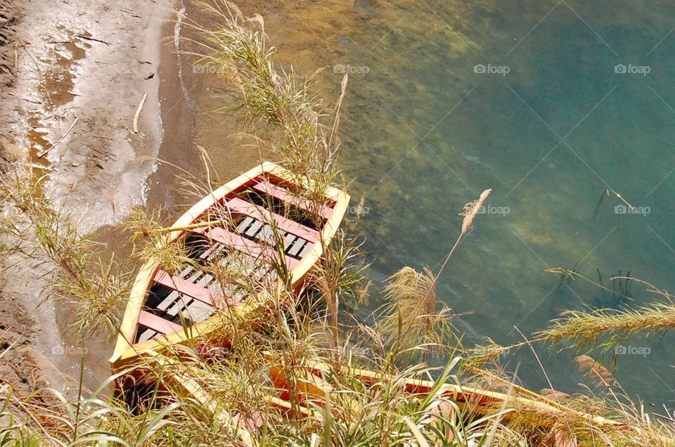 Docked boat in a crater lake