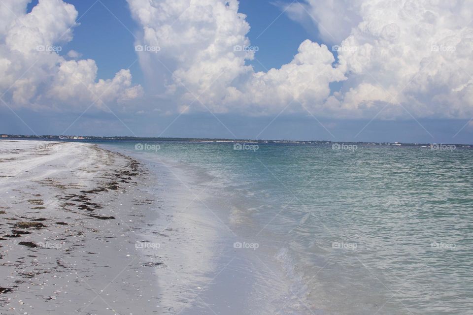 Tall Beach Clouds