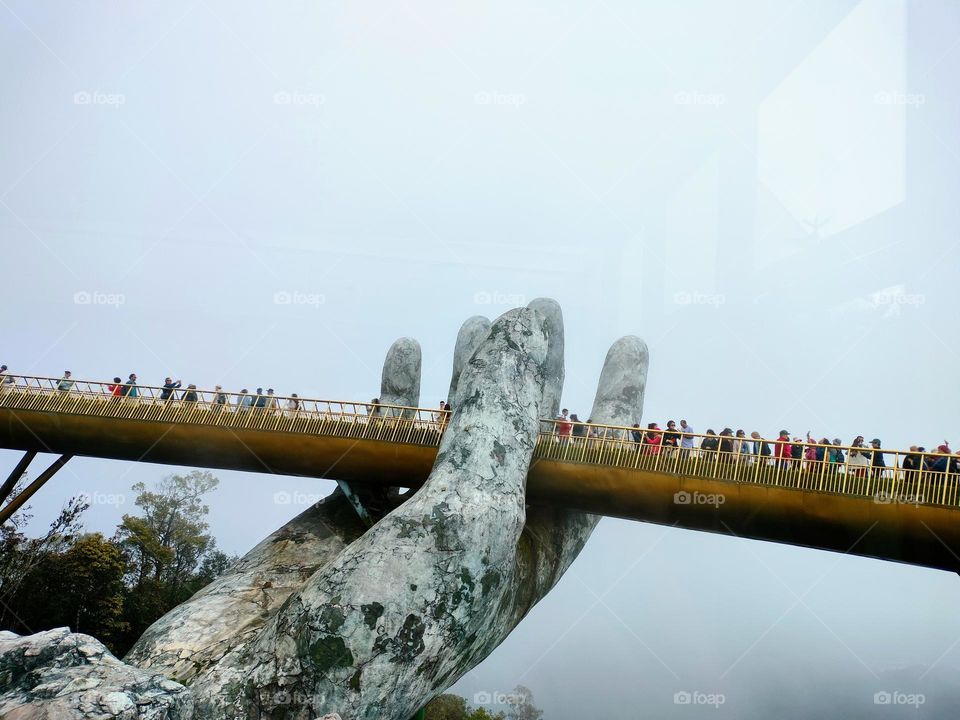 A Bridge Cradeled by Hand Carved out from Mountain