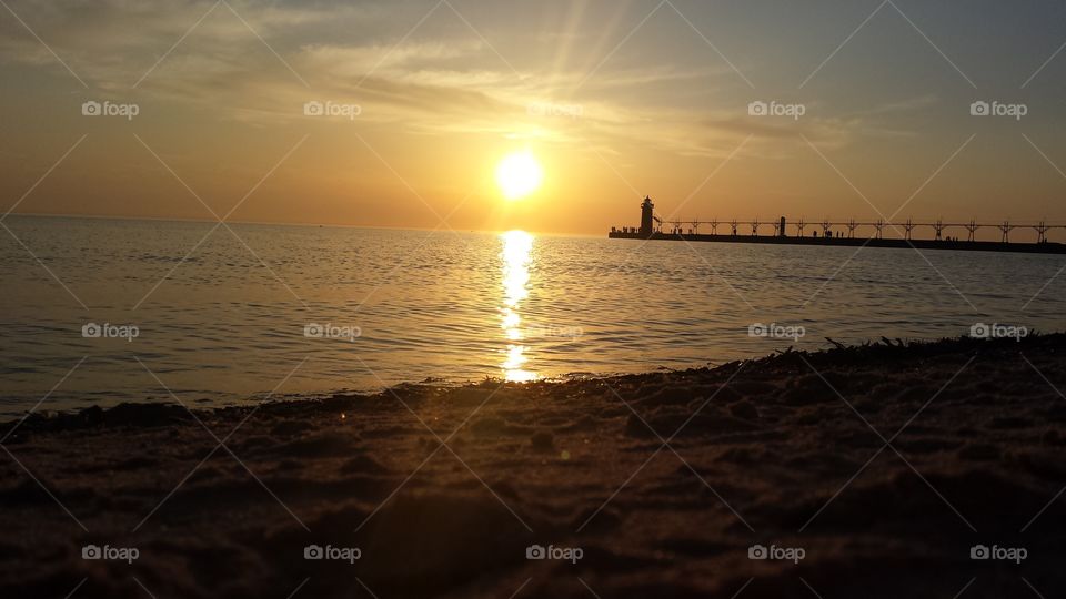 Sunset On Lake Michigan . A beautiful sunset by the famous pier of Lake Michigan.
