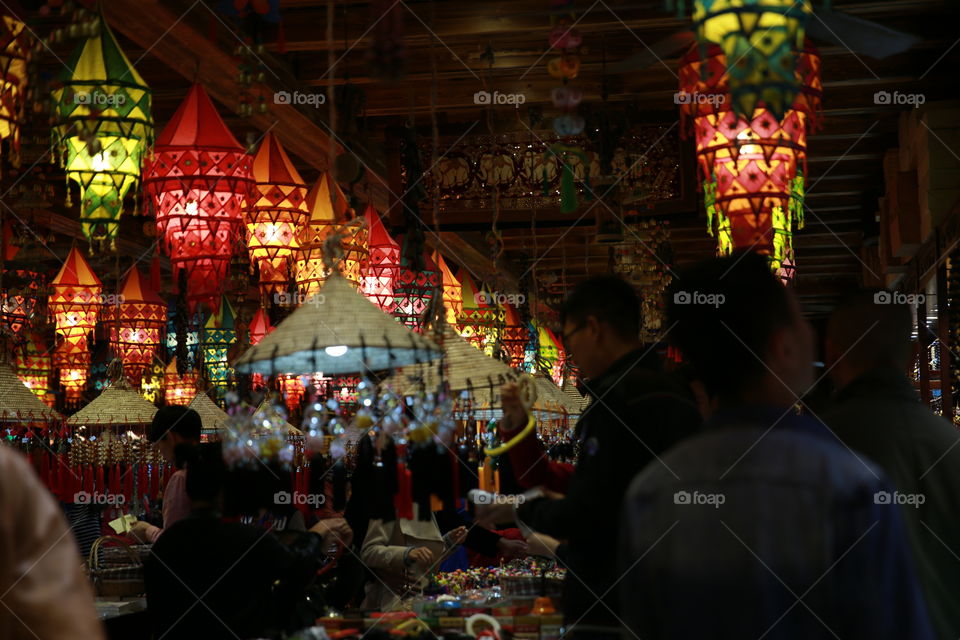 Illuminated lantern in shop