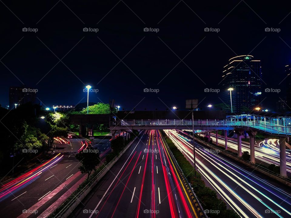 traffic lights in the city of Jakarta at night.